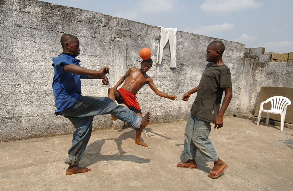 African Children Playing Football